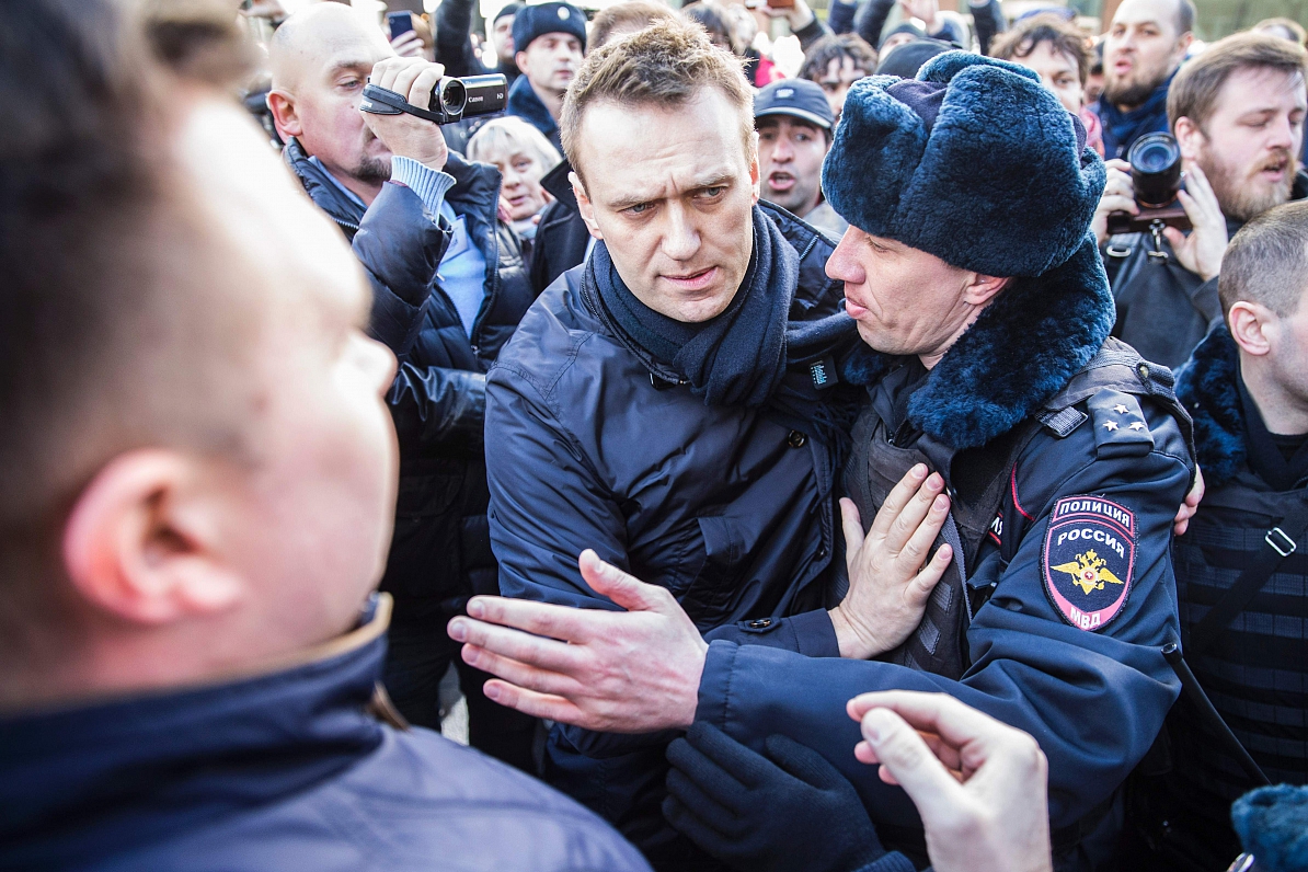 This handout picture taken and provided by Evgeny Feldman for Alexei Navalny's campaign on March 26,...