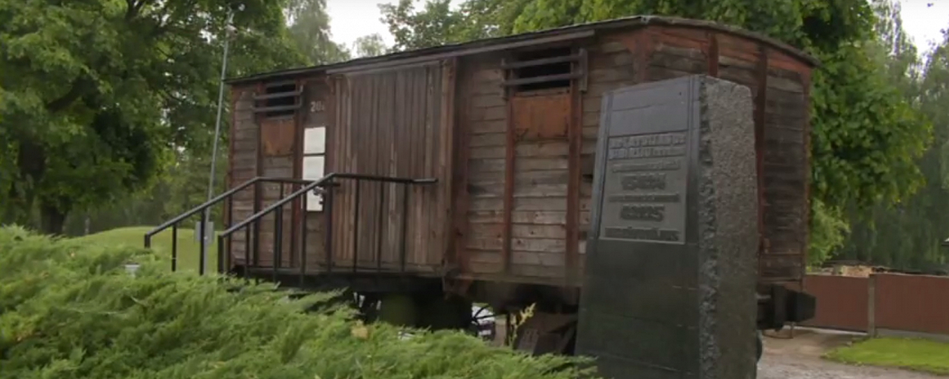 A cattle car in which people were taken thousands of kms across Russia