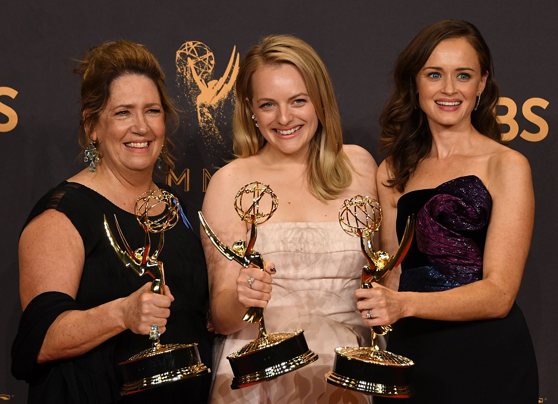 Ann Dowd, Elisabeth Moss and Alexis Bledel pose with the award for  Outstanding Drama Series for &qu...