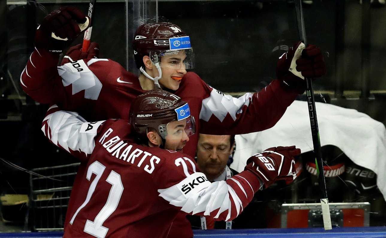 Kristiāns Rubīns celebrates with Latvian national team member Roberts Bukarts