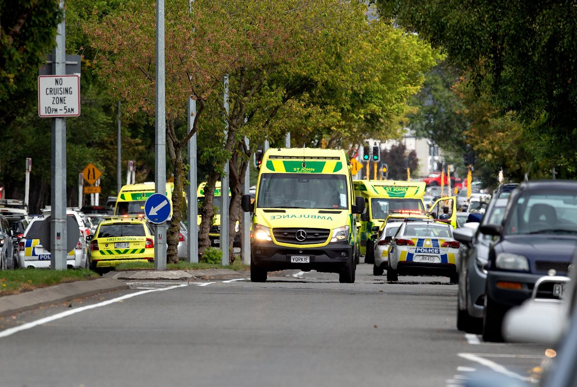 epa07438176 Ambulances and police outside the mosque following a shooting resulting in multiple fata...