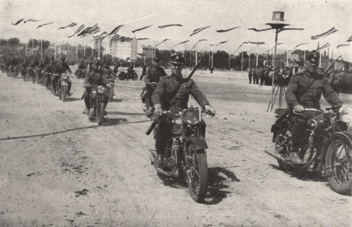 Members of the Aizsargi on bikes during a parade, 1939.