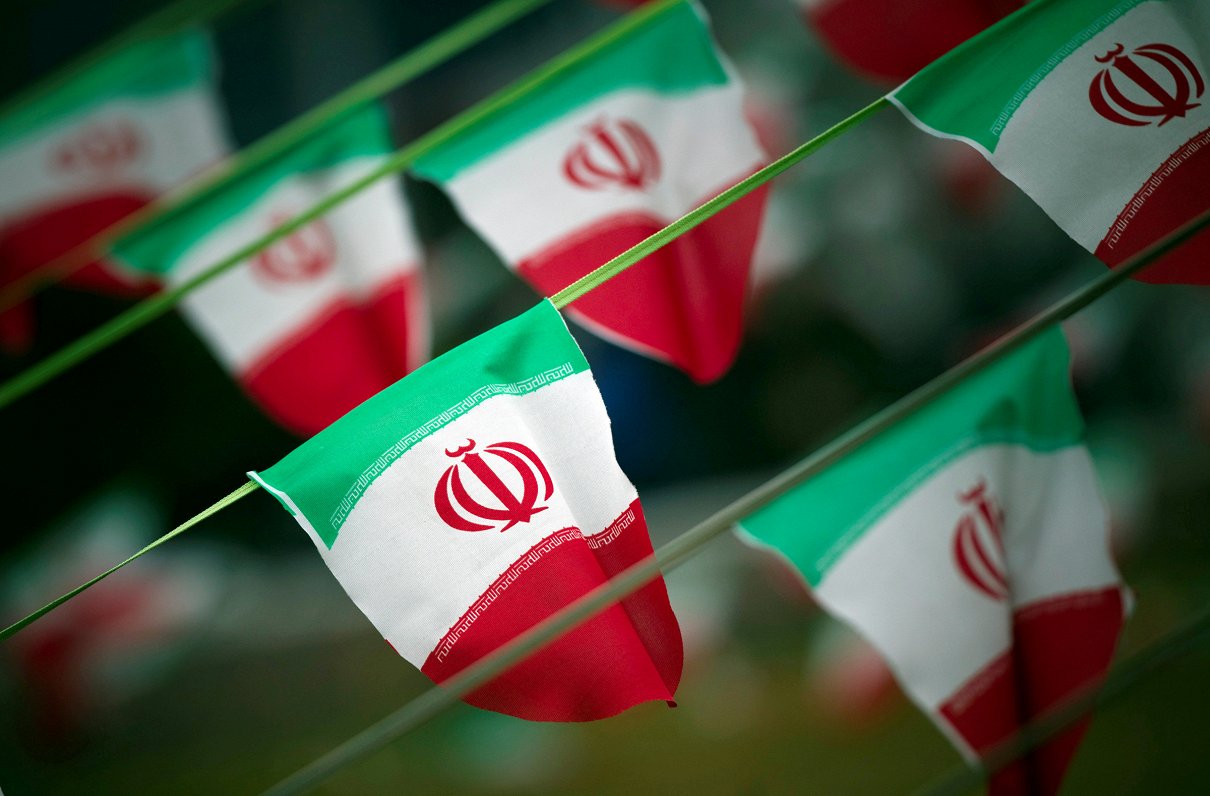 FILE PHOTO: Iran's national flags are seen on a square in Tehran February 10, 2012, a day before the...