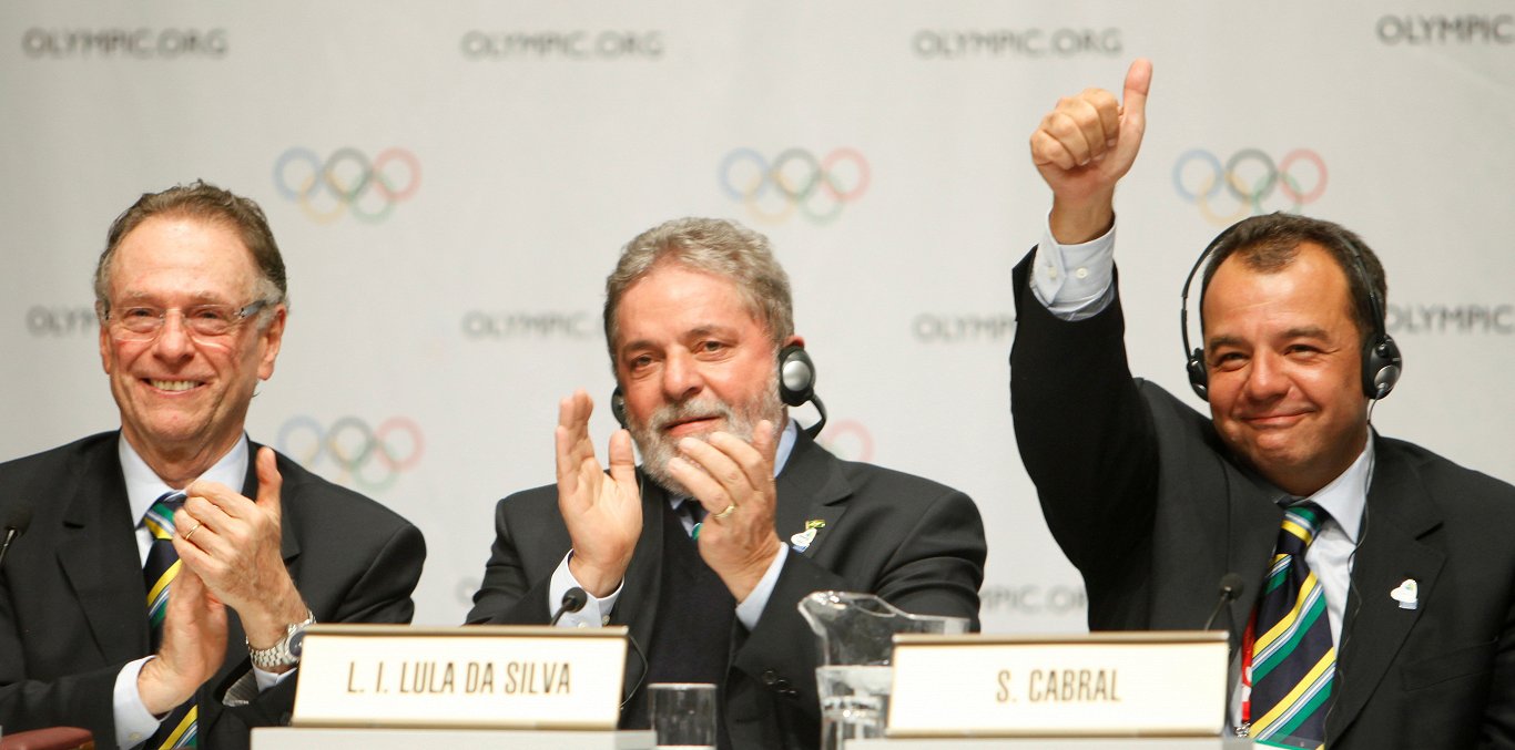 Riodežaneiro olimpiskās kandidatūras prezidents Karluss Nuzmans (no kreisās), prezidents Luiss Lula...