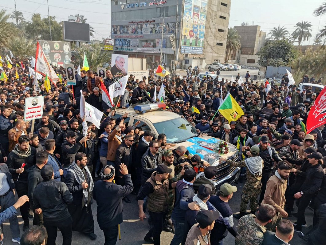 Mourners attend the funeral of the Iranian Major-General Qassem Soleimani and the Iraqi militia comm...