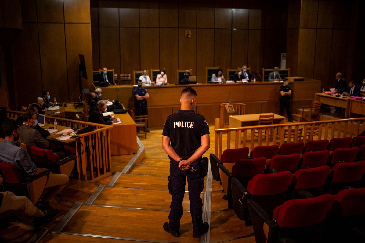 Tiesas sēde, kurā Grieķijas ekstrēmistu līderiem piespriež 13 gadu cietumsodu. 14.10.2020.