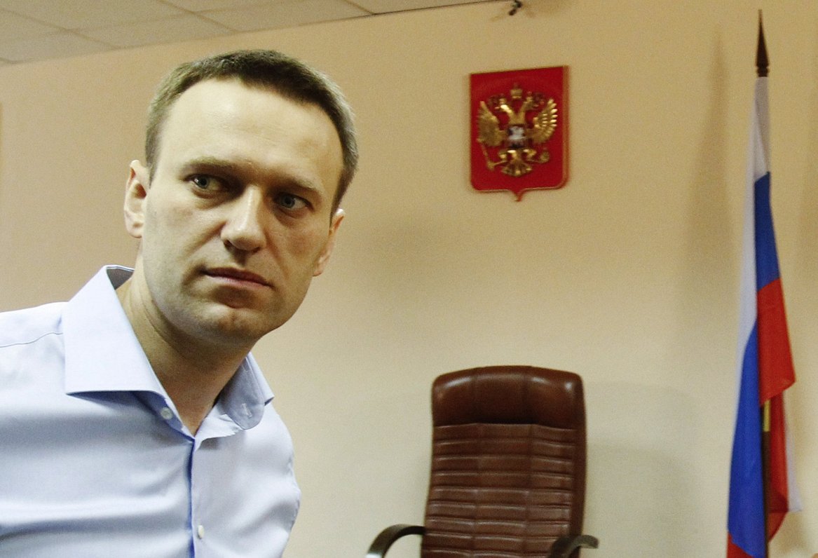 Krievijas opozīcijas līderis Aleksejs Navaļnijs tiesas procesa laikā. 2014. gads.