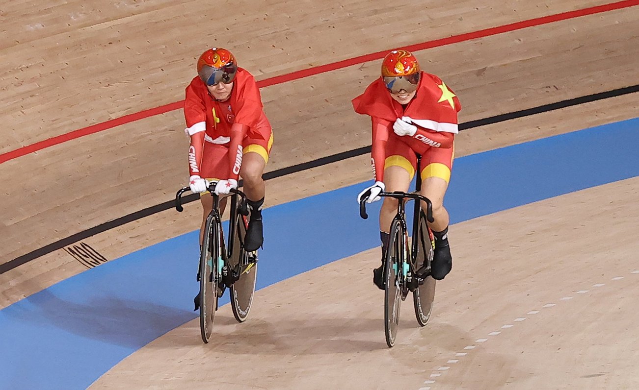 Olimpiskās čempiones  Bao un Žona no Ķīnas