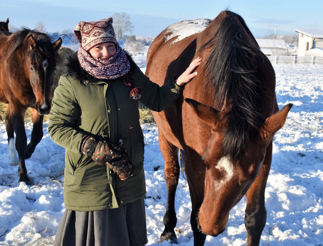 Māra Dakare with her horses at 'Ezernieki' farm