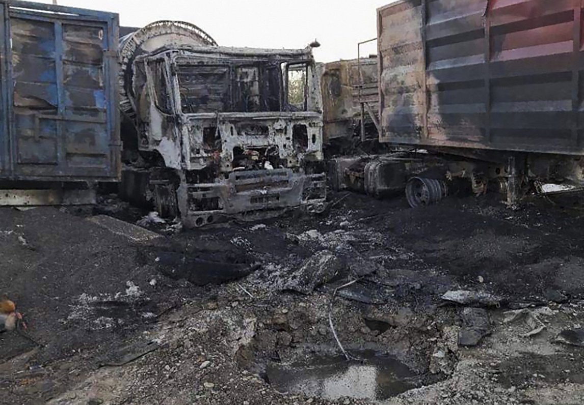 Сожженные грузовики после налета дронов. Украина, Одесса.  13.09.2023