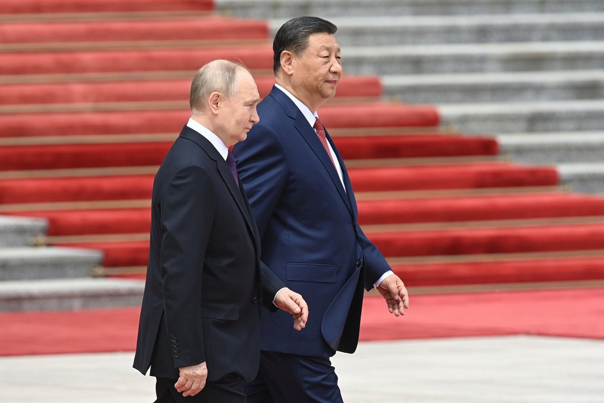 Ķīnas un Krievijas līderi Sji Dziņpins un Vladimirs Putins